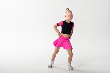 Portrait of child with cochlear implant during dance practice in studio. Copy space. Hearing loss treatment, auditory rehabilitation, assistive medical device, emotional adaptation, and inclusive