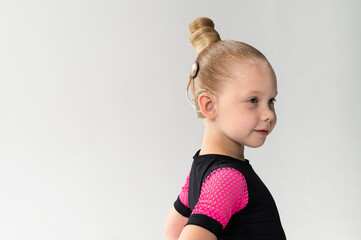 Child head with cochlear implant hearing aid. Copy space.