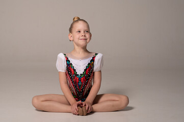 Portrait of child with cochlear implant during dance practice in studio. Hearing loss treatment, auditory rehabilitation, assistive medical device, emotional adaptation, and inclusive healthcare