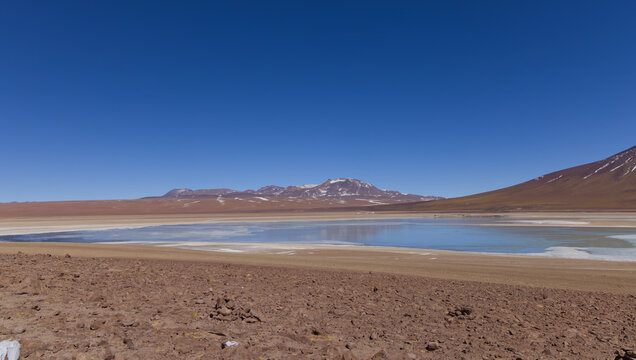 View of Laguna Blanca with its surrounding volcanoes, Bolivia