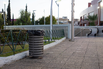 trash can near an underground railway