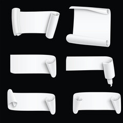 White paper scrolls on black background