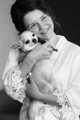 brunette bride in a tight wedding dress in a studio