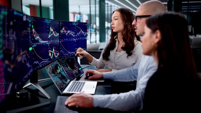 Stock Traders Monitor Multiple Screens