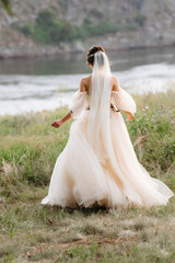 girl are walking in the green hills