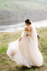 girl are walking in the green hills