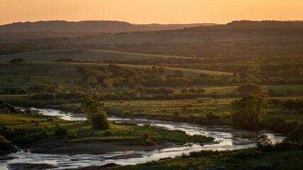 casting a warm glow over the landscape.