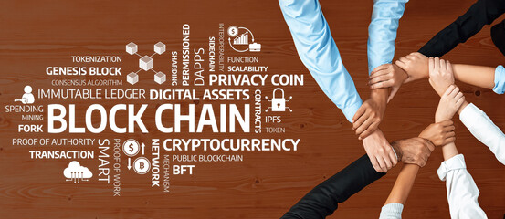 A high-angle view of diverse hands joining together symbolizes collaboration in the blockchain sector, illustrating the importance of teamwork in the evolution of digital assets and technology. Amity