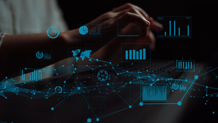 An abstract image depicting data analysis with charts and graphs, showcasing technology and connectivity in a modern workspace environment. Xenic