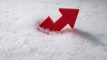 Red arrow rising in snow symbolizing growth and progress in cold environment
