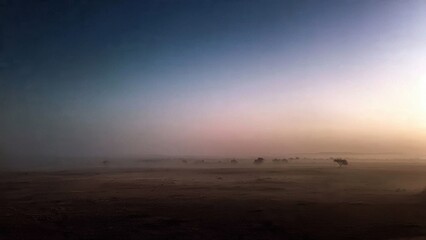 Misty African Landscape at Sunset