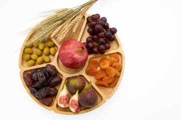 Tu bishvat seder plate with seven species