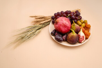 Fototapeta na wymiar Seven species concept with fresh and dried fruits