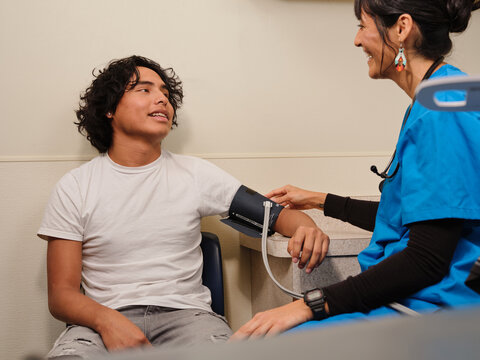 Native American teen gets blood pressure checked