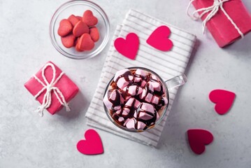 Red velvet hot cocoa drink with marshmallow topping