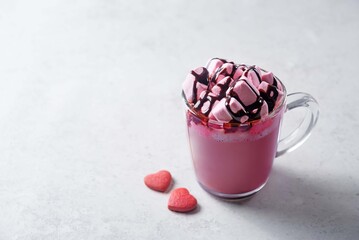 Red velvet hot cocoa drink with marshmallow topping