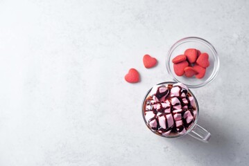 Red velvet hot cocoa drink with marshmallow topping