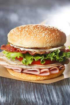 Triple Meat Smoked Turkey, Ham and Bacon Club Sandwich