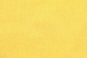 Texture of yellow fabric as background, top view © New Africa