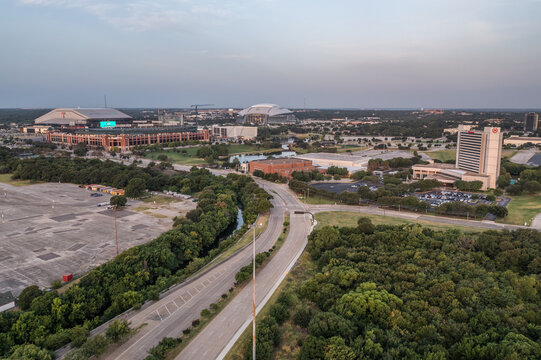 Aerial Drone View of Globe Life Field and Surrounding Roads and Buildings in Arlington, Texas At Sunset