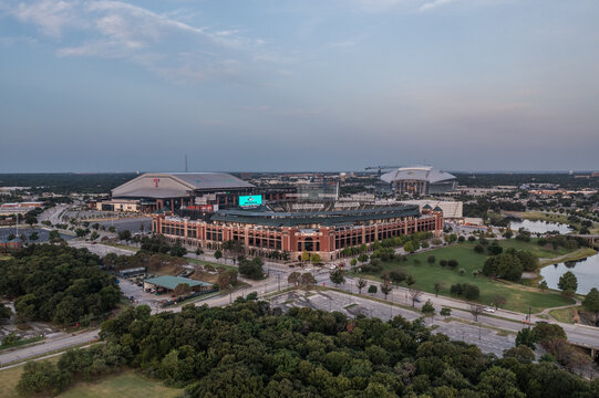 Aerial Drone View of Globe Life Field and Surrounding Roads and Buildings in Arlington, Texas At Sunset