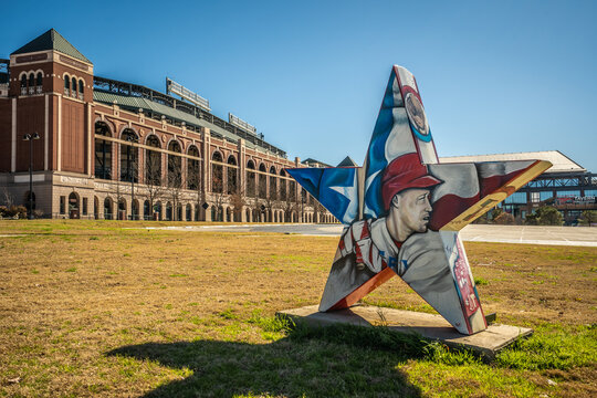 Bright Sun Behind Star Shaped Mural Painting of Famous Baseball Player Outside of Globe Life Field in Arlington, Texas