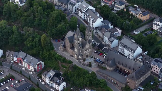 Aerial view of clervaux abbey and sts. Cosmas and damian church in luxembourg