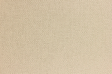 Fototapeta premium Close-up of beige wallpaper texture with fabric texture