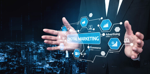A professional businessman presents digital marketing strategies using virtual technology over a city skyline at night, showcasing innovation in the digital landscape. Tessel