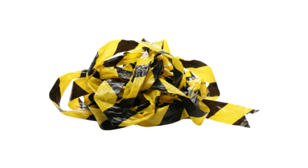 Caution tape messy pile yellow and black warning banner
