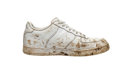 Dirty white leather sneaker with brown mud stains isolated