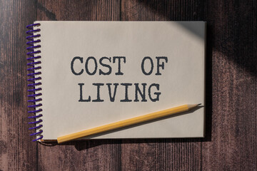 Cost of living crisis symbol. Concept words Cost of living crisis on wooden blocks