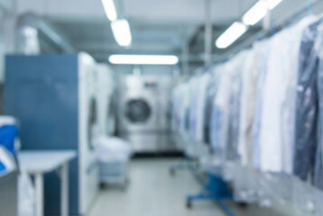Fototapeta premium Blurred view of a clean and modern laundry or dry cleaning facility