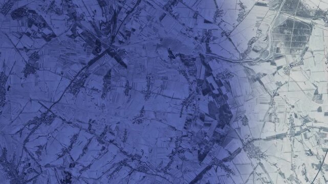 Snow covered agricultural landscape at dawn, sunrise time lapse animation based on Nasa imagery