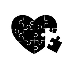 Black Heart Shaped Jigsaw Puzzle Pieces.