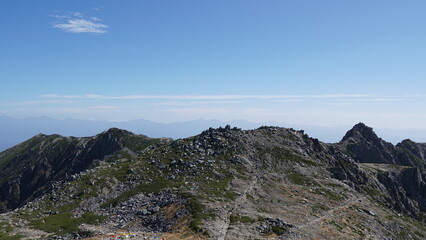 Obraz premium Autumn Hiking Scenery at Mount Kisokomagatake: Vibrant Fall Colors on Kisokomagatake Trail in the Japanese Alps, Japan