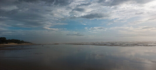 Fototapeta premium Brazil coast at sunset. Dramatic sky, dark clouds. 