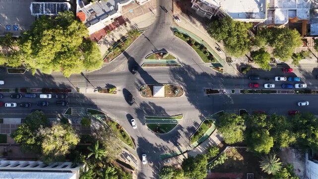 Aerial drone flying sideways over Colonia Roma with Paseo de la Reforma skyline and hazy sky in M&eacute;xico City. Shot in D-Log M