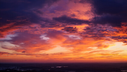 Dramatic Sunset Sky With Vibrant Red And Purple Hues Perfect For Background And Wallpaper Use