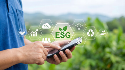 Person using a smartphone displaying ESG Environmental Social Governance icons in a bright natural o