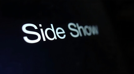 Close-up of &ldquo;Slide Show&rdquo; text, glossy metallic look with a shallow depth-of-field, white letters against deep black, subtle reflections; 4K HD