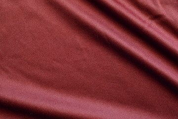 Red sports clothing fabric football jersey texture close up