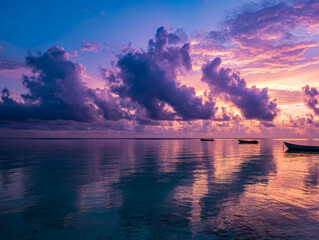 A colorful sunset over the sea creates a romantic mood with glowing skies and calm waves. The scene invites peace, reflection, and quiet moments.
