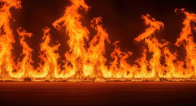 A fiery inferno consuming a dark background.