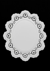 White Decorative Doily On Black Background