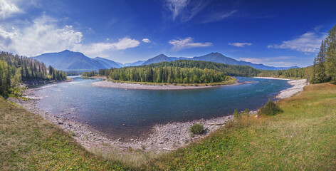 Mountain river on a summer day, river bend, picturesque sky, panoramic view