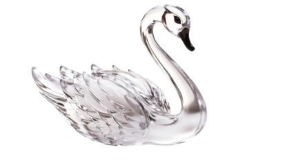 A crystal swan sculpture against a black background