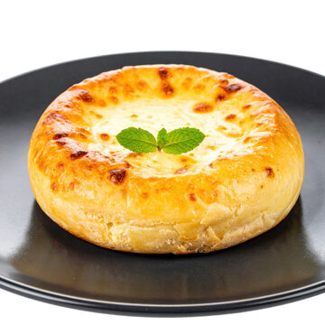 Traditional Jani cheese pie, a festive Latvian treat with a distinctive caraway flavor, isolated on white background.
