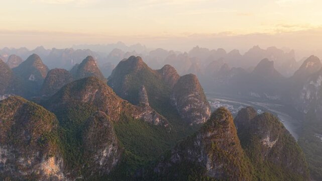 Sunrise aerial view of karst landscape near Xianggong Mountain, Yangshuo, Guilin, China