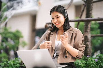 Fototapeta premium Portrait young adult beautiful business woman wearing headset work confidence smiling communication